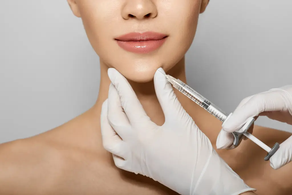 Non-surgical jawline enhancement for sharp definition at The Confidence Collective in Sioux Falls, SD.